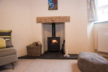 This little wood-burner keeps toes toasty warm!