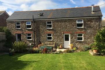 Reskivers Cottage viewed from the big, level garden.