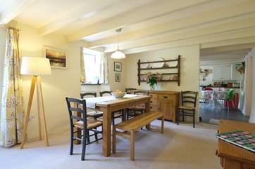 The dining area is open through to the kitchen.
