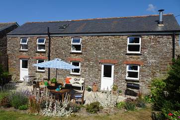 Reskivers Cottage viewed from the big, level garden.