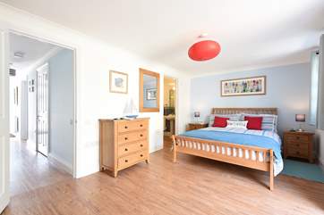 Bedroom 2 has an en suite shower-room and doors leading out to the patio.