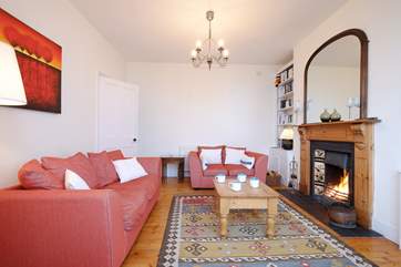 Enjoy the open fire in the sitting-room.