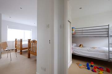 The twin bedroom and bunk-room are right next door to each other.