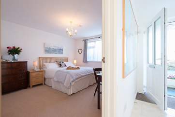 The entrance hall looking through into Bedroom 1.