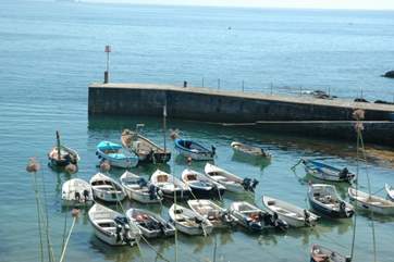 Boats bobbing in the harbour.