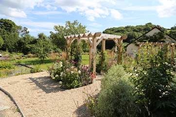 The front garden has a pergola.