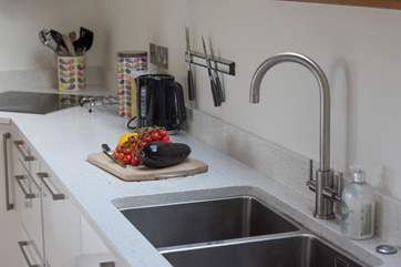 Cook up a storm in the well-equipped kitchen.