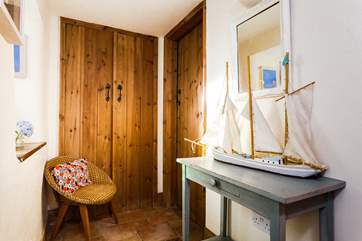 The ground floor hallway with bedroom 1 on the right-hand side.