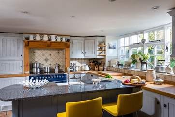 The breakfast-bar and kitchen.
