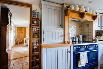 From the kitchen to the end of the ground floor hallway.
