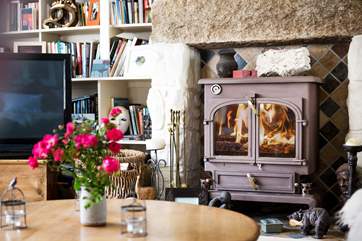A roaring wood-burner in the sitting-room.