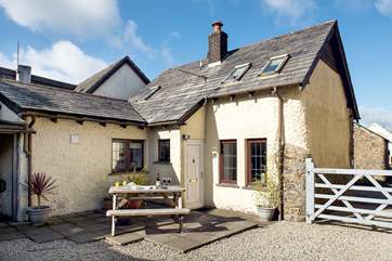 Welcome to Bluebell Cottage - the pretty enclosed courtyard is a lovely place to sit and relax