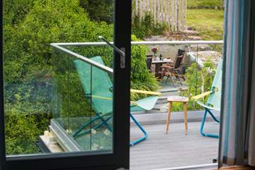 The second floor master bedroom has its own private balcony - enjoy watching the sun rise as you start the day.