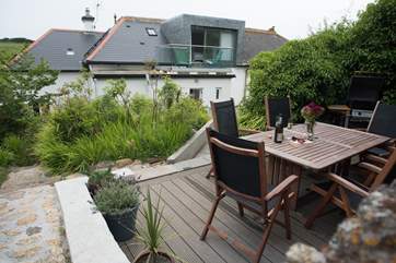 The decked barbecue terrace looking towards the property.