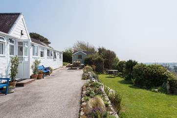 There is an area of garden to the front of the cottage and another to the side where there is a fenced in pond, the field below is just for guests too.