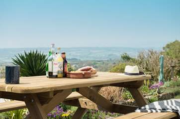 Breakfast, lunch or dinner outside with that view.