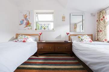 The twin bedroom is at the far end of the house.