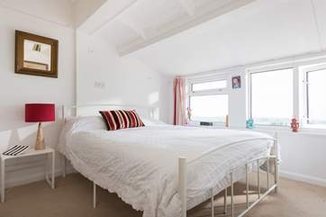 Bedroom 1 has a 5ft king-size bed and amazing sea views.