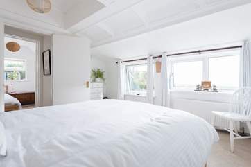 This lovely bedroom 2 also has windows with sea views so the room is flooded with light.