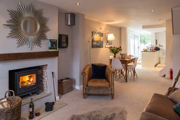 The sitting, dining and kitchen areas are all open plan, creating a delighful space.