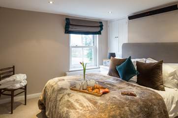 The master bedroom has a super comfy 5ft bed, with luxurious goose down duvet, pillows, and river views.
