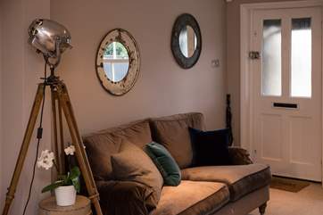 The luxurious sitting-room has some beautiful vintage features and a BOSE sound system.
