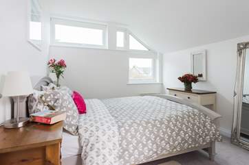 The double bedroom is a light and relaxing space.