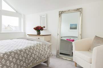 This lovely room also has a large walk in wardrobe.