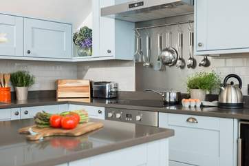 The stylish and very well-equipped kitchen even has a wine fridge.