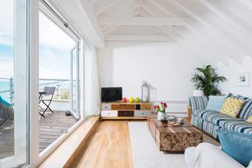 French doors open straight out onto the balcony.