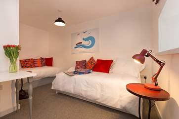 This twin bedroom is also on the ground floor. The L shape of the room allows plenty of space for two guests sharing this room.