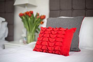 Bright colours balance with the gentle greys and soft whites.