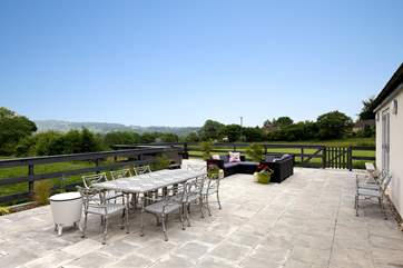 This is a terrace and a half! A real sun-trap and with fabulous views.