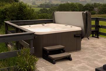 What a setting for the hot tub! You can enjoy sitting under the stars or an early morning soak as the sun rises.
