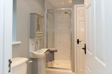 There is a spacious shower-room with a walk-in shower.