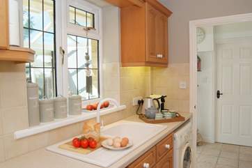 The kitchen is off the entrance hall which is light and airy - with a welcoming feel to the cottage the moment you step inside.