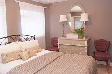 This is one of the two double bedrooms - tranquil and stylish.