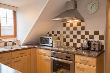 The kitchen sits in the central part of this first floor open plan studio.