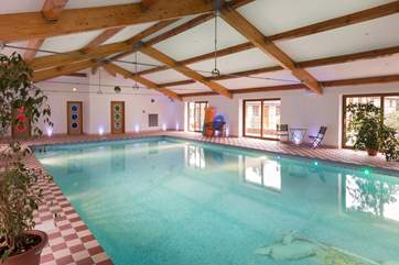 Guests at The Coach House and at The Cottage share full use of this amazing 13 metre indoor heated swimming pool. There is an outdoor tennis court too !