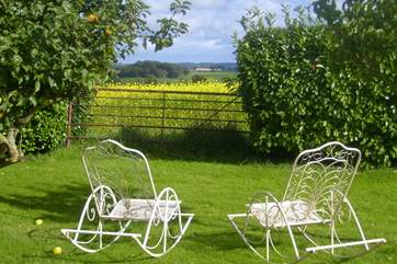 One of the tranquil places to sit in the lovely gardens