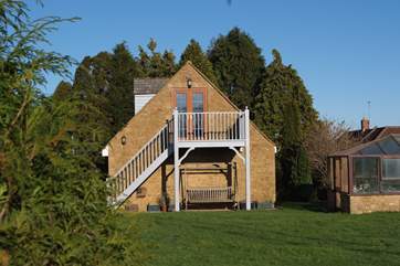 The Coach House is the first floor of this pretty barn conversion. The balcony gives fantastic panoramic views over the countryside