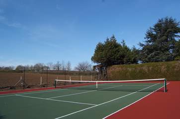 The tennis court is for you to enjoy too. What a setting for a game ! Racquets and balls are provided.