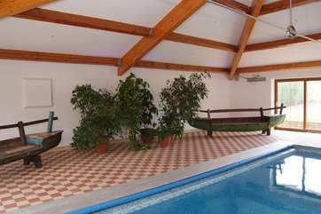 fabulous seating creates an exotic feel to this excellent pool room.