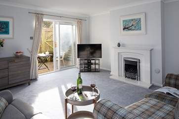 The comfy sitting room is the perfect place to relax after a busy day exploring.