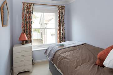 The single room looks onto the high street.