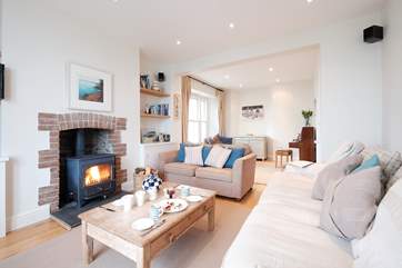 The sitting-room with cosy wood-burner.