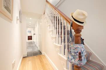 Stairs lead up to the first floor.