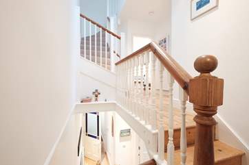 Further stairs lead up to the second floor.