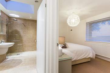The bedroom to the right and the wet-room to the left.
