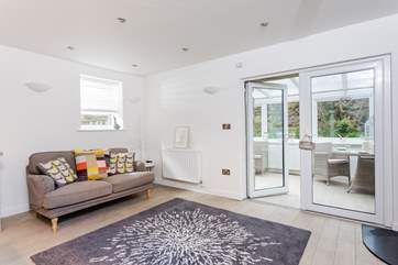 Through the sitting-area into the sun-room.